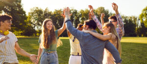 Adults having fun outside during summertime