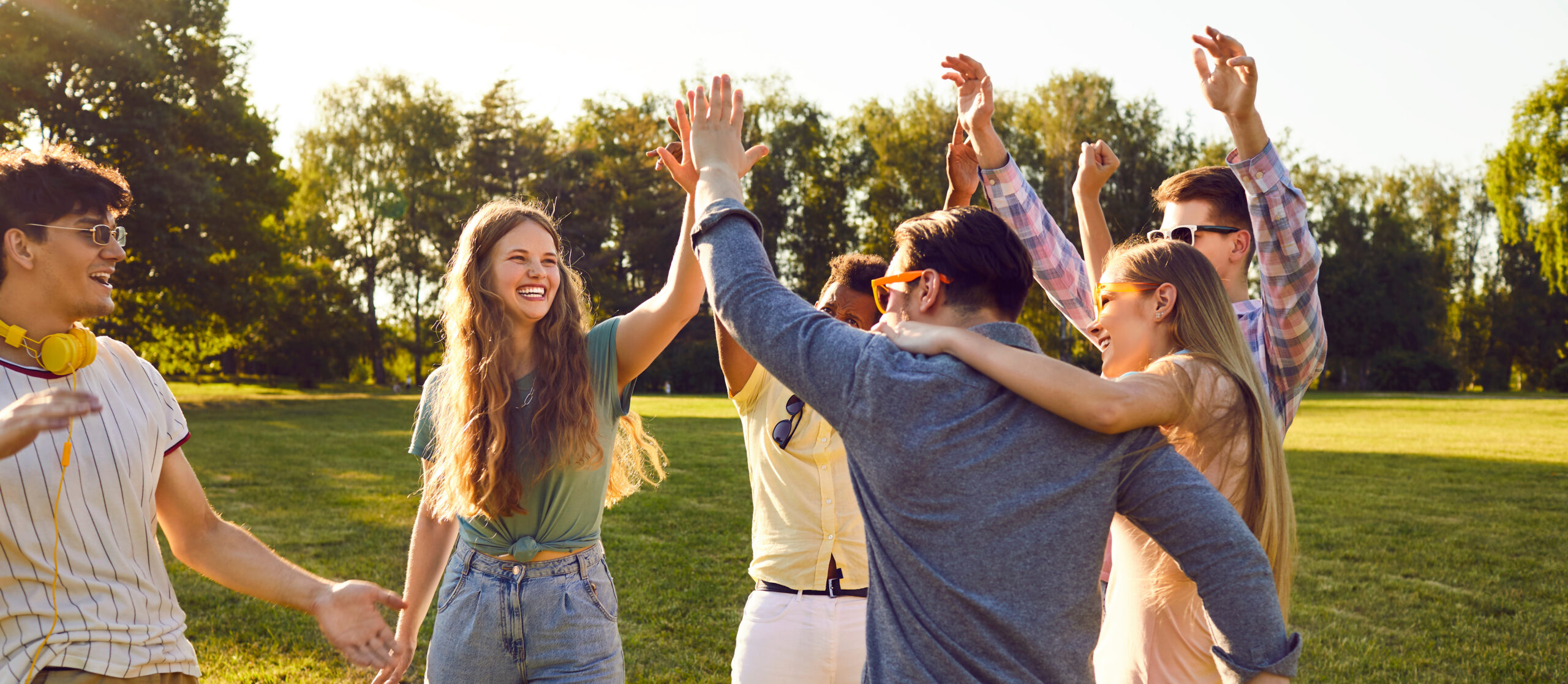 Adults having fun outside during summertime