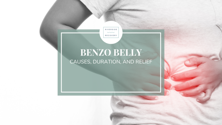 Adult holding their abdomen during the bloating, distension, and cramping of benzo belly, the digestive symptoms of benzodiazepine withdrawal